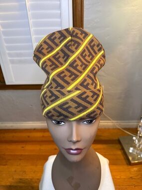 Brown Beanie with Yellow Stripe Logo Pattern